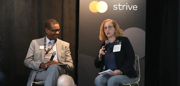 From left to right: Joe Battle, General Manager of Business Services at Carolina Community Impact and Melissa Malkin-Weber, Co-Director of the North Carolina Clean Energy Fund.