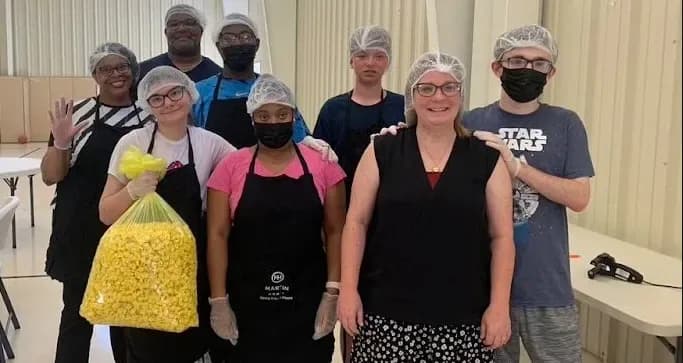 The Mickey’s Popcorn team in their production facility.