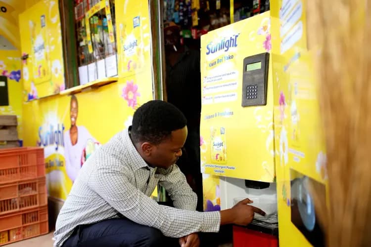 Novek’s washing powder dispensing machine in a micro-retailer’s Kenyan shop. Photo credit: Eugene Kaiga.