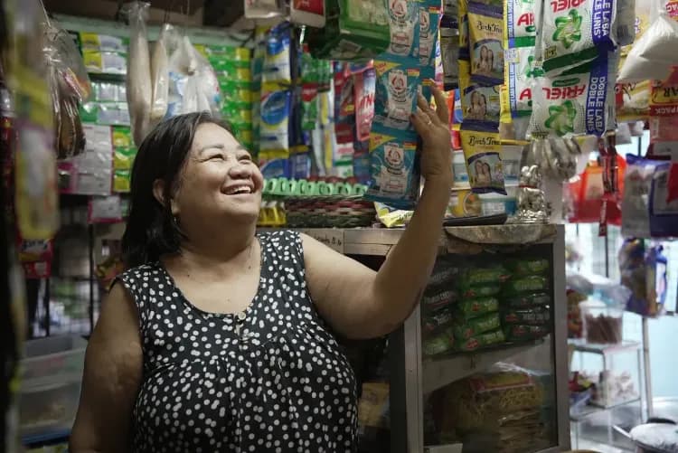Rose Guanzon Maningas, a sari-sari shop owner in Bulacan, Philippines
