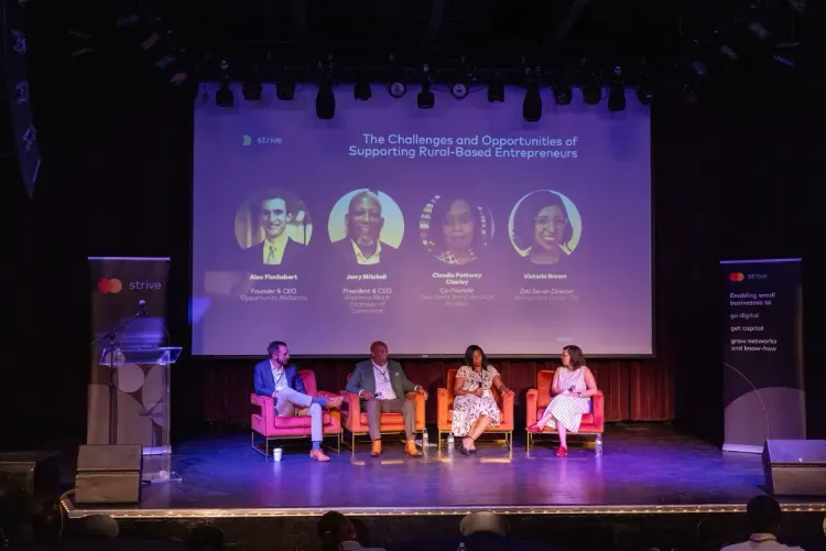 Panelists Alex Flachsbart, Jerry Mitchell from the Alabama Black Chamber of Commerce, and Claudia Pettway Charley discuss the challenges and opportunities of supporting rural-based entrepreneurs with moderator Victoria Brown of DAI.